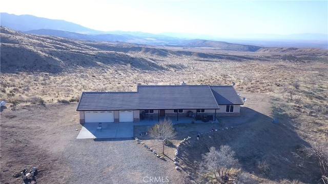 bird's eye view with a mountain view