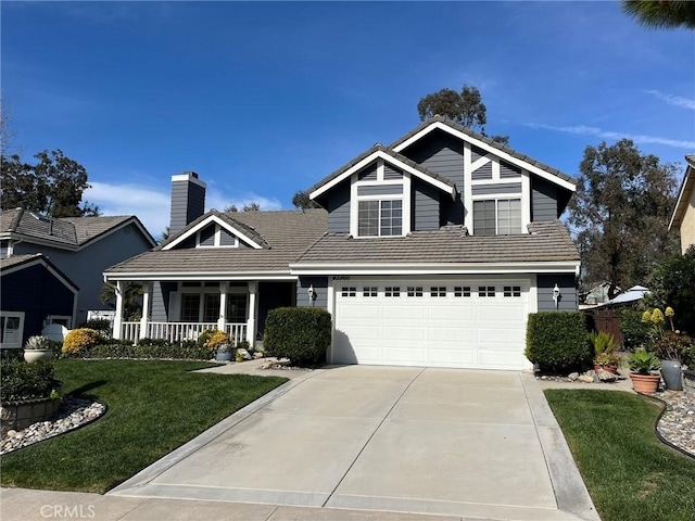 43966 Highlander Dr, Temecula, CA 92592 - traditional-style house with concrete driveway, a porch, a front yard, and a tiled roof