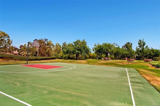 43966 Highlander Dr, Temecula, CA 92592 - view of basketball court with community basketball court, a lawn, and view of wooded area