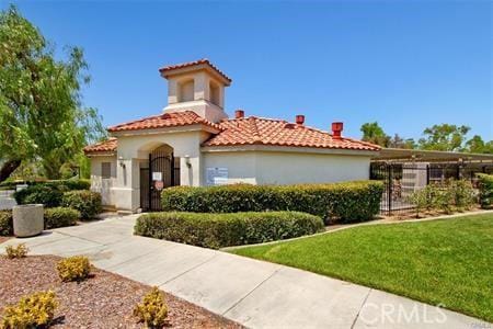 43966 Highlander Dr, Temecula, CA 92592 - mediterranean / spanish-style home with a gate and stucco siding