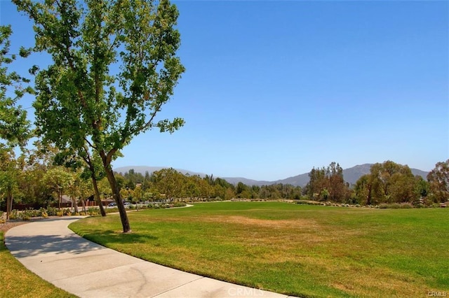 43966 Highlander Dr, Temecula, CA 92592 - view of home's community with a mountain view and a yard
