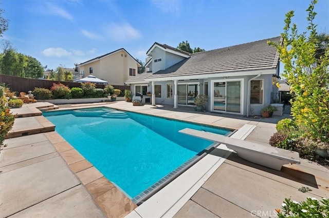 43966 Highlander Dr, Temecula, CA 92592 - view of swimming pool featuring a patio area, a diving board, and a fenced backyard
