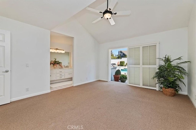 43966 Highlander Dr, Temecula, CA 92592 - empty room with light colored carpet, a ceiling fan, baseboards, and vaulted ceiling