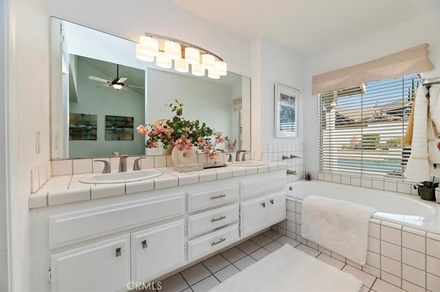 43966 Highlander Dr, Temecula, CA 92592 - full bathroom featuring double vanity, a garden tub, tile patterned flooring, and ceiling fan