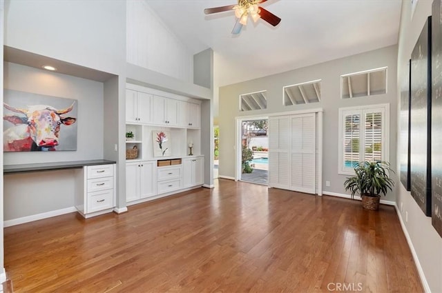 43966 Highlander Dr, Temecula, CA 92592 - unfurnished office featuring a high ceiling, a ceiling fan, and wood finished floors