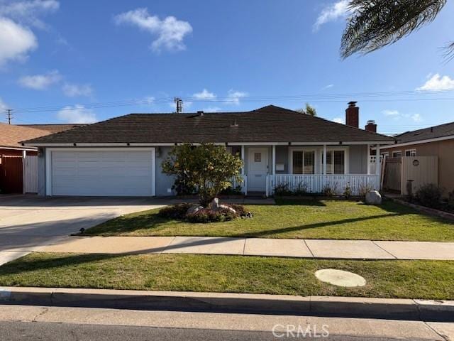 ranch-style house with stucco siding, a porch, concrete driveway, a front yard, and an attached garage