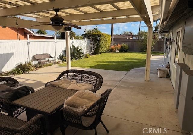 view of patio with a fenced backyard and a pergola