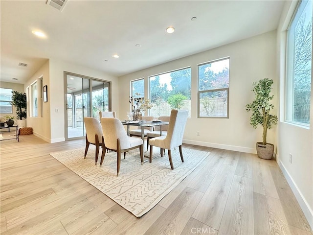 dining area featuring recessed lighting, visible vents, baseboards, and light wood-style floors