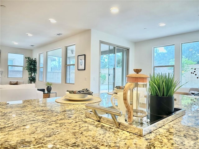 dining room featuring recessed lighting, visible vents, and plenty of natural light