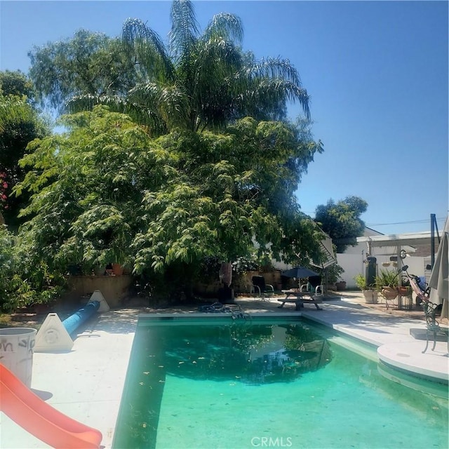 pool featuring a patio