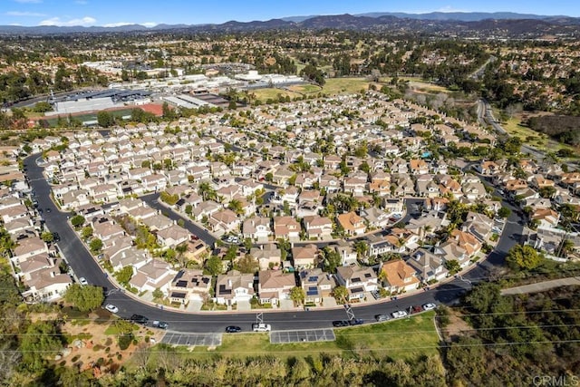 aerial view with a mountain view and a residential view