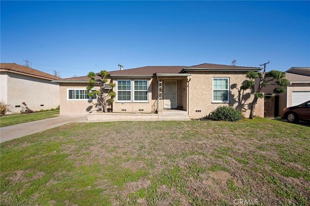 ranch-style home with crawl space, stucco siding, and a front lawn