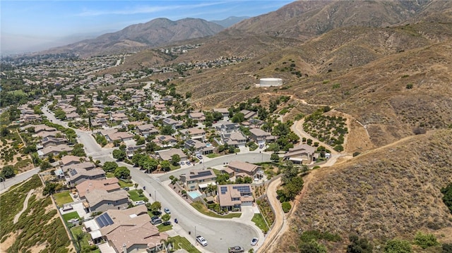 drone / aerial view with a mountain view and a residential view