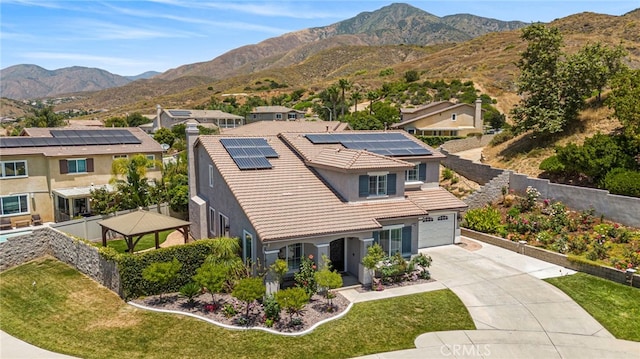 exterior space with a residential view and a mountain view