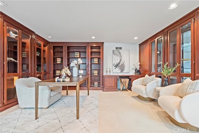 home office with recessed lighting, visible vents, and light colored carpet