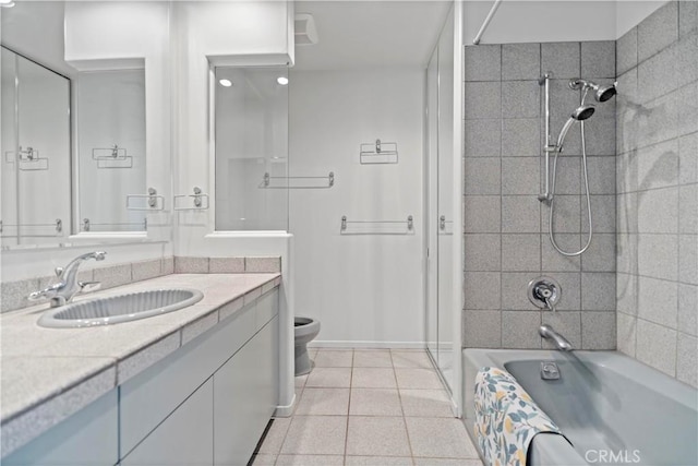 full bath featuring baseboards, toilet, shower / tub combination, tile patterned floors, and vanity