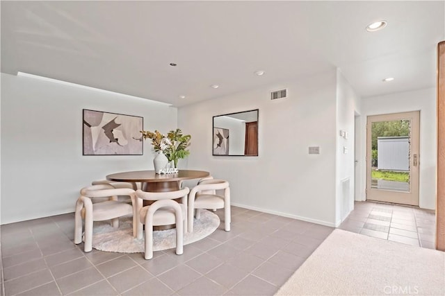 dining area with tile patterned flooring, visible vents, recessed lighting, and baseboards