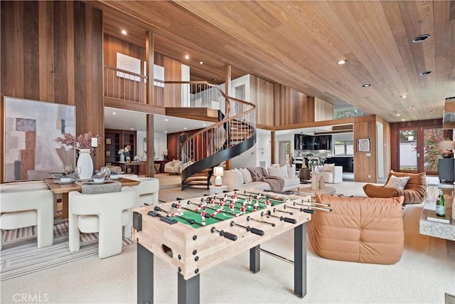 game room featuring wooden ceiling, wooden walls, recessed lighting, and high vaulted ceiling