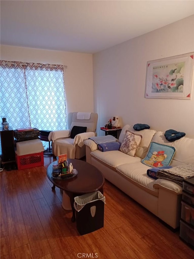 living area with wood-type flooring