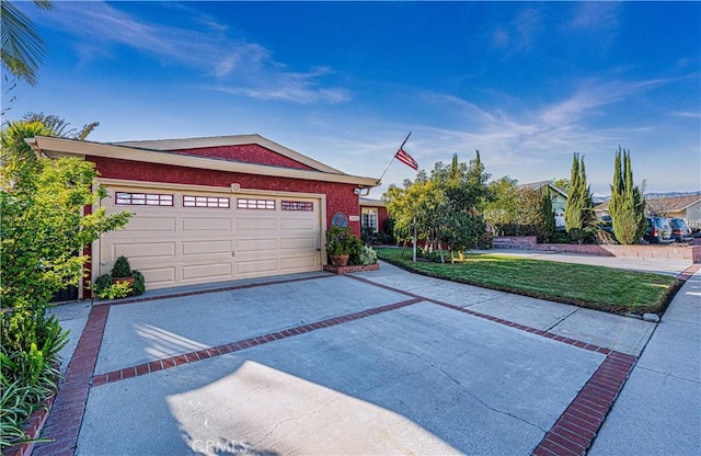 garage with concrete driveway