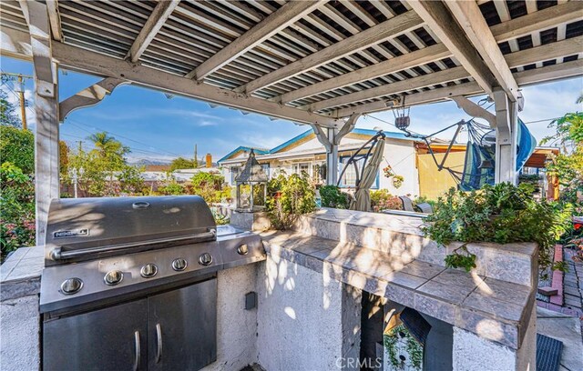 view of patio with grilling area and area for grilling