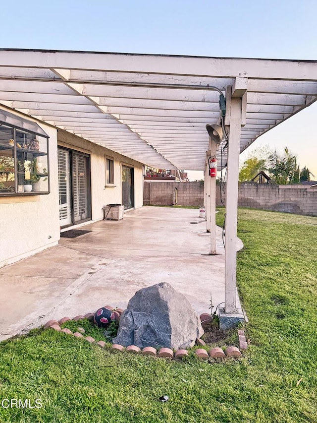 view of patio / terrace with fence and a pergola