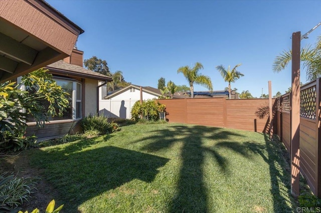 view of yard featuring a fenced backyard