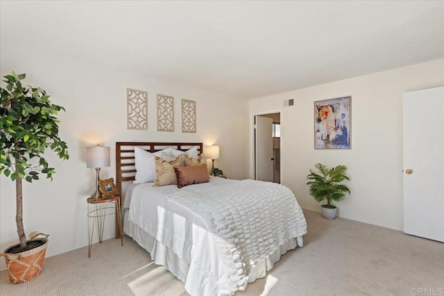 bedroom featuring visible vents and carpet floors