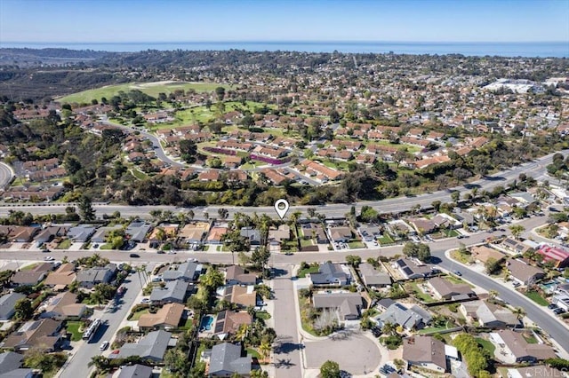 aerial view featuring a residential view and a water view