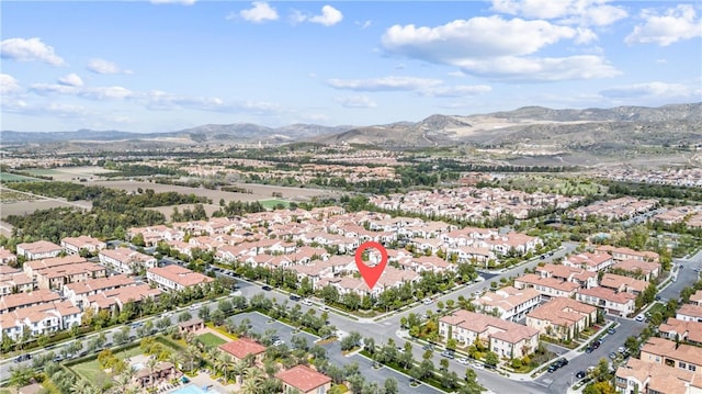 aerial view with a mountain view and a residential view