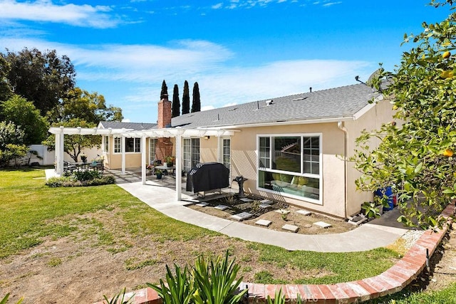 back of property featuring stucco siding, a pergola, a patio, a yard, and a chimney