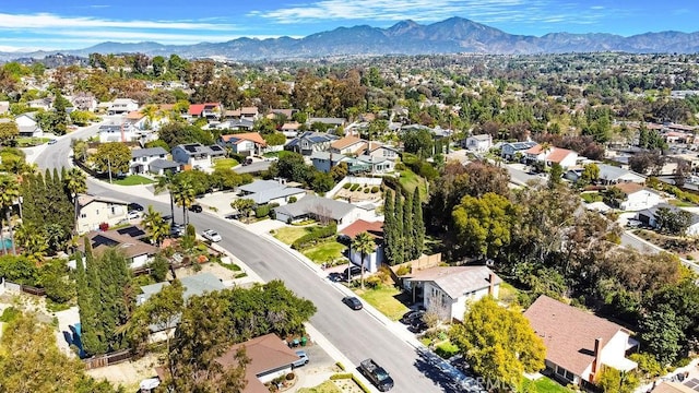 drone / aerial view featuring a mountain view and a residential view