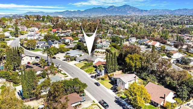 bird's eye view with a residential view and a mountain view