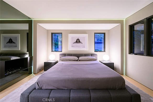 bedroom featuring wood finished floors