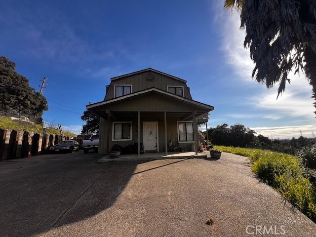 view of front of home featuring covered porch