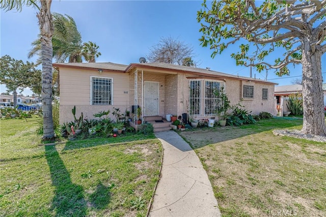 ranch-style house with a front yard