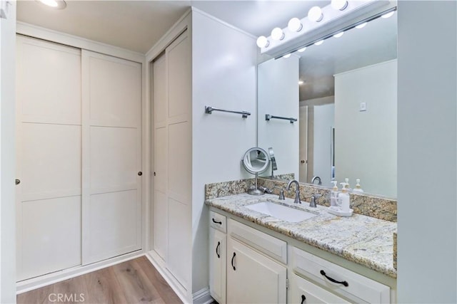 86 Calle Aragon Unit O, Laguna Woods, CA 92637 - bathroom featuring wood finished floors and vanity