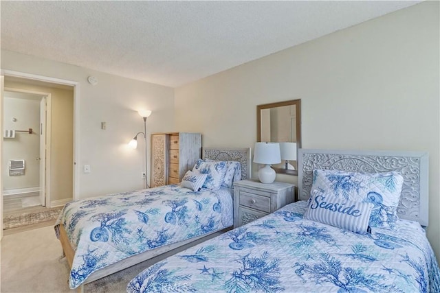 86 Calle Aragon Unit O, Laguna Woods, CA 92637 - carpeted bedroom with a textured ceiling