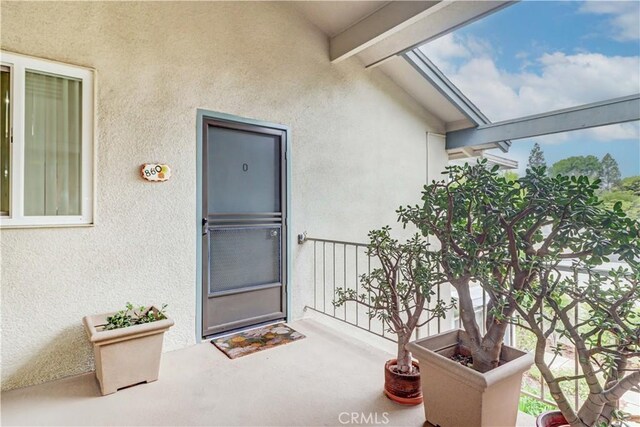 86 Calle Aragon Unit O, Laguna Woods, CA 92637 - entrance to property with stucco siding