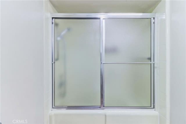 86 Calle Aragon Unit O, Laguna Woods, CA 92637 - full bathroom featuring a tile shower