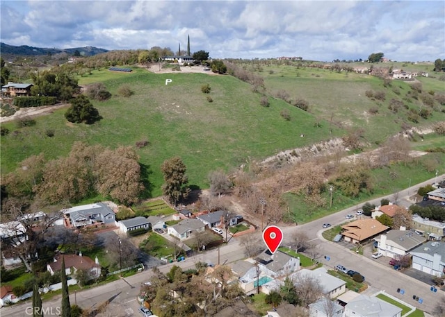 birds eye view of property featuring a rural view