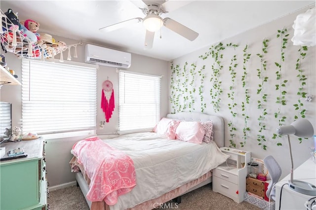 bedroom featuring ceiling fan, carpet, and a wall mounted AC