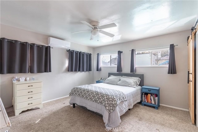 bedroom featuring baseboards, multiple windows, and an AC wall unit