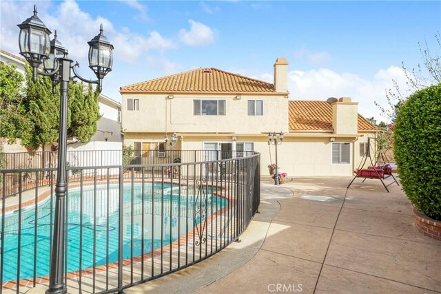 18429 Germain St, Porter Ranch, CA 91326 - view of pool featuring a patio and a pool with connected hot tub