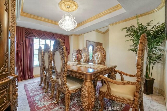 18429 Germain St, Porter Ranch, CA 91326 - dining area featuring a chandelier, crown molding, and a tray ceiling