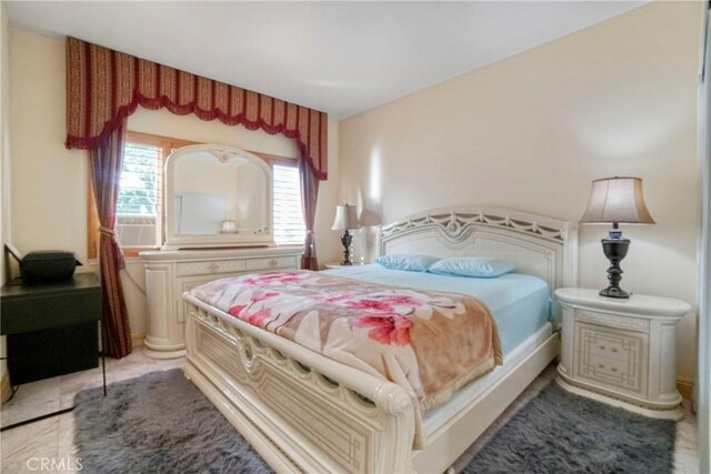 18429 Germain St, Porter Ranch, CA 91326 - bedroom featuring light tile patterned floors