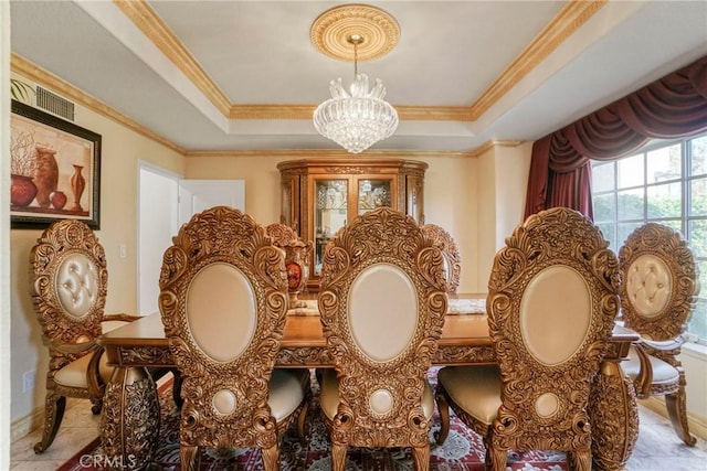 18429 Germain St, Porter Ranch, CA 91326 - dining area featuring a chandelier, a tray ceiling, ornamental molding, and tile patterned floors
