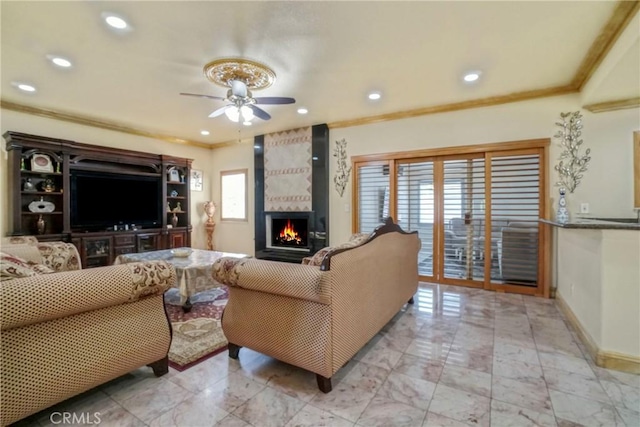 18429 Germain St, Porter Ranch, CA 91326 - living area featuring crown molding, a ceiling fan, a large fireplace, baseboards, and recessed lighting