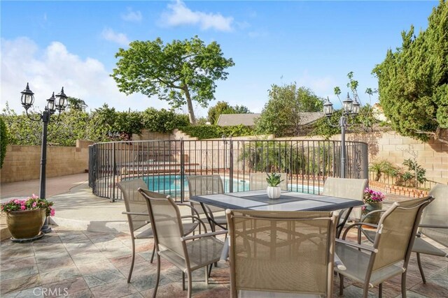 18429 Germain St, Porter Ranch, CA 91326 - fenced backyard with a patio area and outdoor dining space