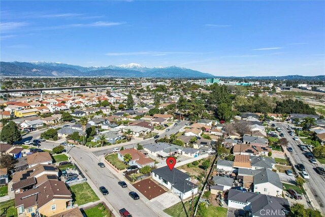 drone / aerial view with a mountain view and a residential view